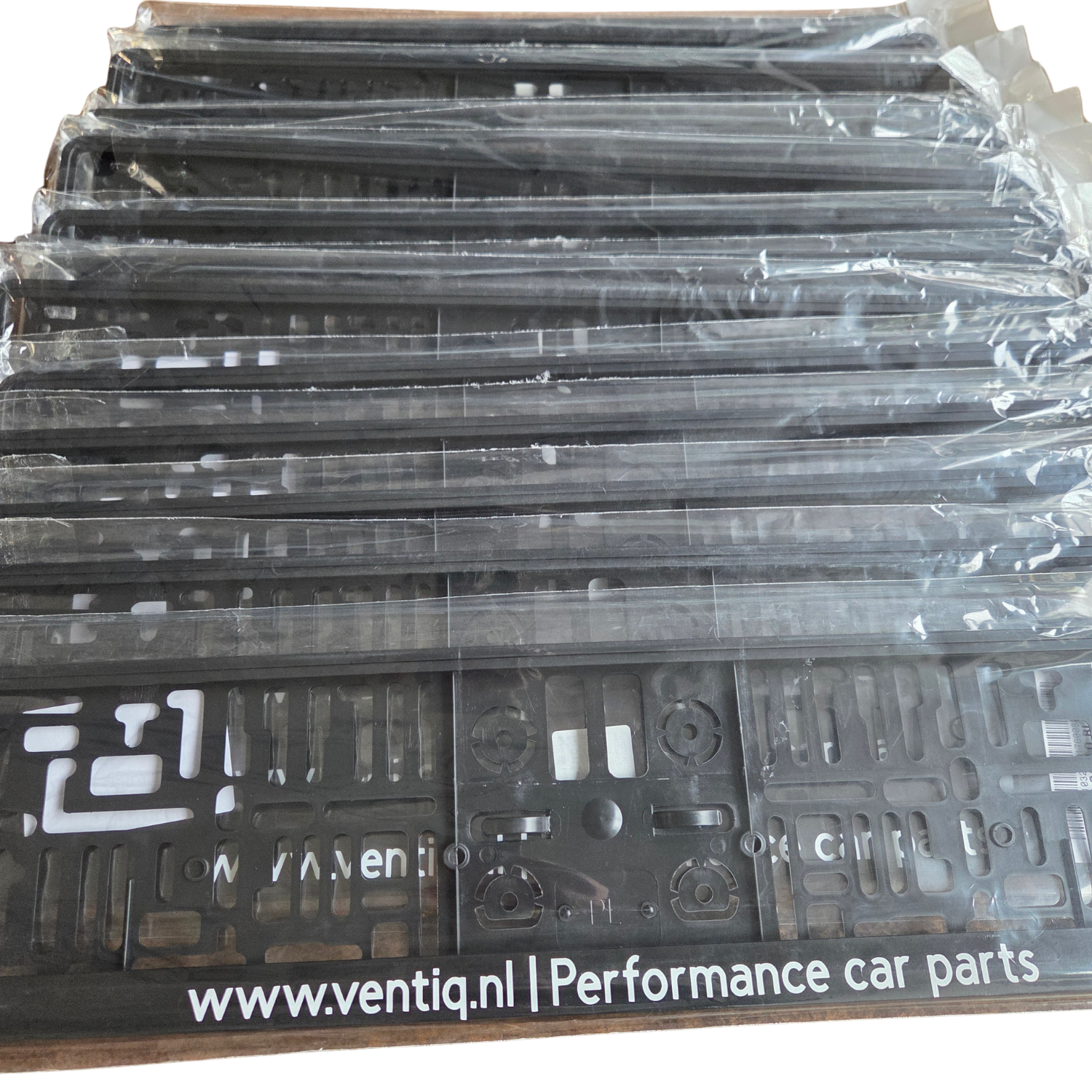 Kentekenplaathouders met website en tekst – bedrukte kentekenplaathouders voor een autobedrijf.