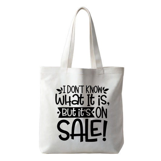 “Tote bag met tekst ‘I don't know what it is, but its on sale’ – Duurzame tas "Handmade by J.