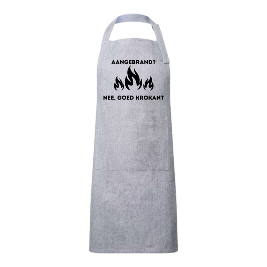 “Keukenschort gepersonaliseerd – cadeau met knipoog” Tekst "Aangebrand nee goed krokant"
